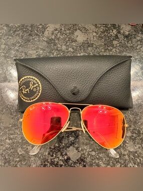 Ray-Ban Aviator Sunglasses with Gold Frame and Red-Orange Mirrored Lenses